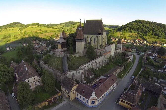 8 Days Private Romania Tour from Bucharest - Maramures: Merry cemetery humor, communism context, and sky-high wooden monasteries