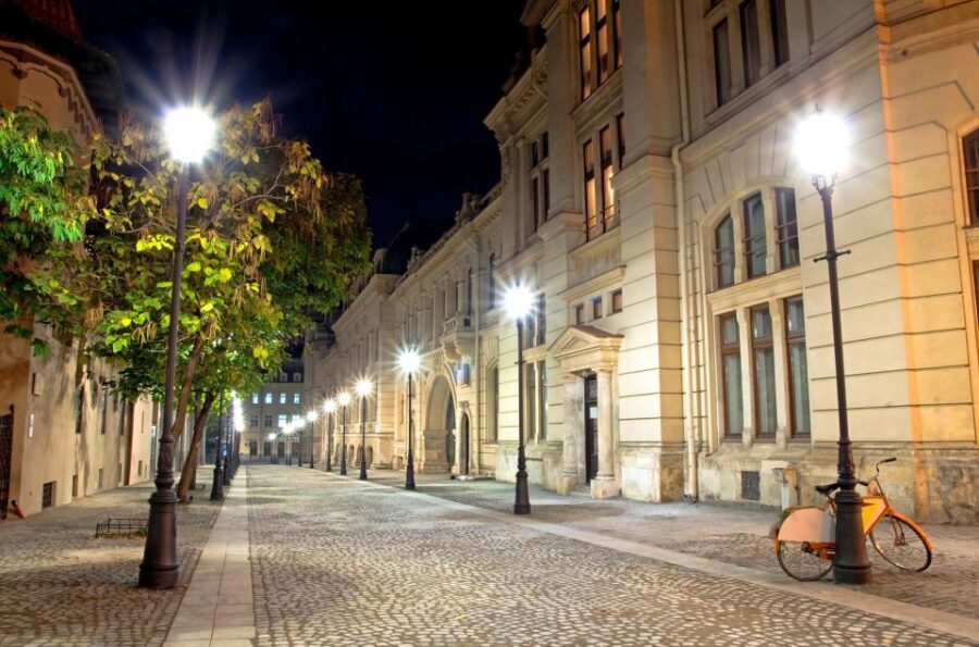 Bucharest: Charm of the Belle Époque Private Tour - Old City on cobblestones: cafes, lamps, and street musicians