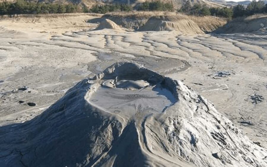 Bucharest: Muddy Volcanoes and Salt Mine Private Day Tour - Slănic Prahova Salt Mine: huge caverns and a steady 12°C