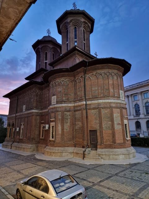 Bucharest: private and exclusive Italian walking tour - Umbrellas Street and Revolution Square: from artful details to 1989