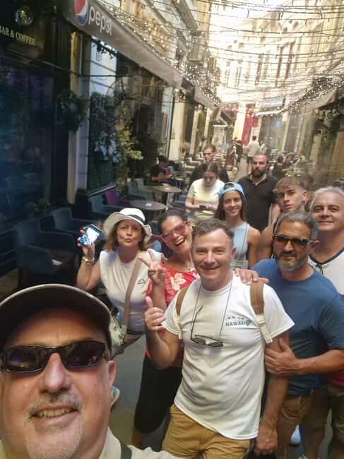 Bucharest: Walking tour with Italian speaking guide for small groups - Where the tour begins: Caru’ cu Bere and getting your bearings