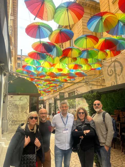 Bucharest: Walking tour with Italian speaking guide for small groups - Lipscani Street and the Old Town core: monasteries, inns, and a nightlife vibe