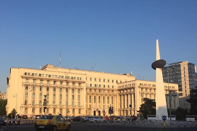 Contrasts of Communism - Small Group Walking Tour in Bucharest - Stop 3: Eroii Revoluției and the working-class blocks in transit