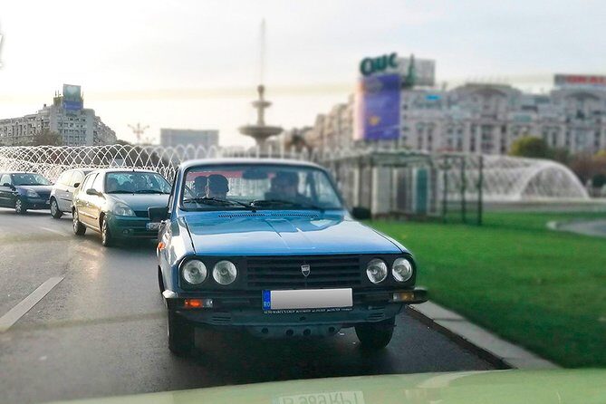 Private -RedPatrol Tour of Bucharest with a Romanian Vintage Car - The “power buildings” stretch: Academia Română and the Palace of Parliament