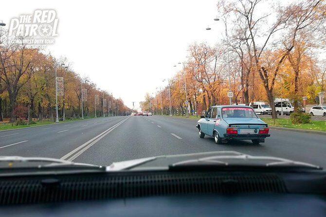 Private - Romanian Vintage Car Driving Tour of Bucharest 120 min - Revolution Square: where the tour kicks off with context
