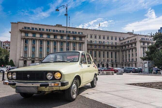 Private - Romanian Vintage Car Driving Tour of Bucharest 120 min - Arcul de Triumf and the photo break that keeps it fun