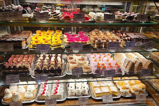 Sweet Delights History and Desserts Walking Tour in Bucharest - Stop 4: Casa Capșa and the Old-School Cake Shop Moment