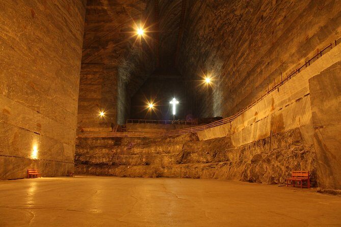 The Salt Mines, The Winery, The Muddy Volcanoes! The Fixers Private Tour - Entering Unirea Salt Mine: 208 meters underground in a 54-meter hall